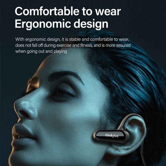 Lenovo XE06 Air Conduction Wireless Sports Earphones resting on a surface, showcasing sleek design and in-ear fit.