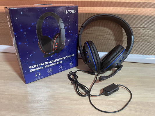 SuperHub H-7260 wired gaming headphones with over-ear design and adjustable headband, featuring a built-in microphone for gaming.