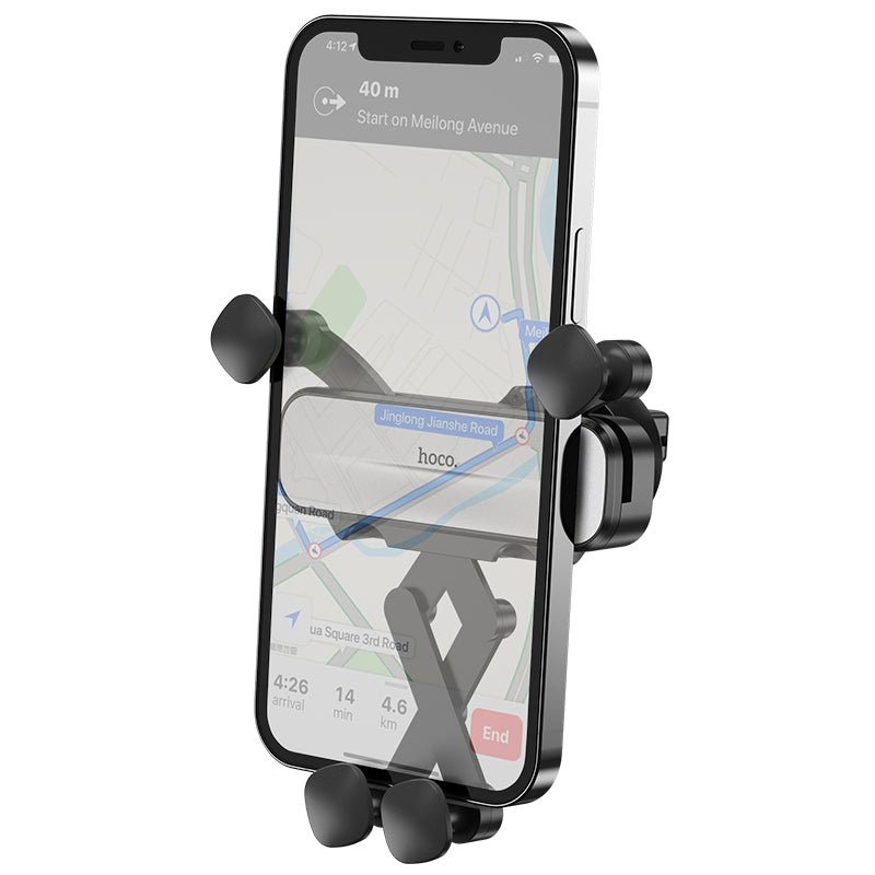 Hoco CA102 retractable gravity car phone holder mounted on vehicle air vent with phone secured in place.