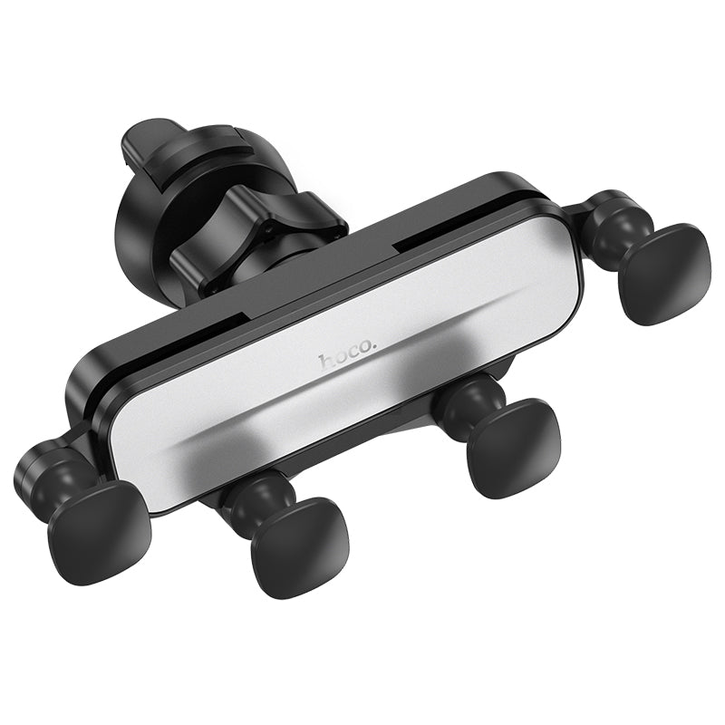 Hoco CA102 retractable gravity air vent car phone holder mounted on vehicle air vent with phone secured in place.